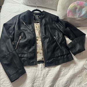 Woman’s black jacket